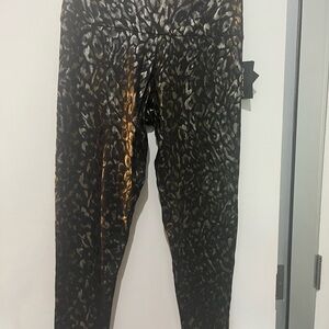Onzie Black and Gold Leggings Bold Animal Print
